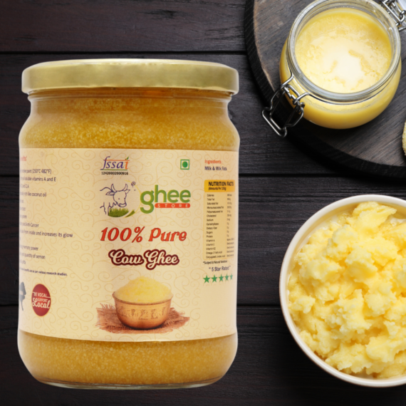 Desi Cow Ghee 1 Kg Price - Pure A2 Bilona Method Ghee. A Jar Of 100% Pure Cow Ghee On A Dark Wooden Surface, Accompanied By A Glass Jar And A Bowl Filled With Ghee.