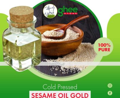 Cold pressed sesame oil bottle next to a bowl of sesame seeds, with text detailing "Sesame Oil Gold" and "100% Pure."