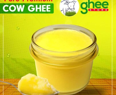 Pure Premium Desi Cow Ghee jar with a spoonful of ghee, green and yellow background with "ghee STORE" logo and website www.gheestore.in.