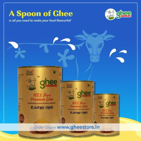 Three Tins Of Ghee In Varying Sizes Against A Blue Background With A Cow Illustration, Featuring The Text &Quot;A Spoon Of Ghee Is All You Need To Make Your Food Flavourful!&Quot; And A Website Link &Quot;Www.gheestore.in&Quot;.